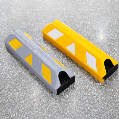 Kopen Reflective Rubber Wheel Stop for Commercial Parking Areas Asphalt & Concrete Surfaces online vervaardiging